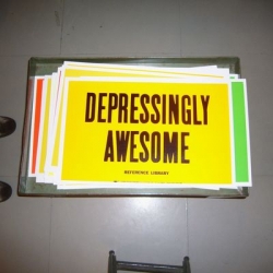 Depressingly Awesome! Fun posters at Kiosk