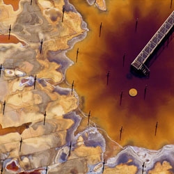 Abstraction of Destruction, a show of J. Henry Fair’s aerial photographs at Gerald Peters Gallery. This is “Lightning Rods”” (2009), depicting a holding tank at an oil sands facility in Alberta, Canada.