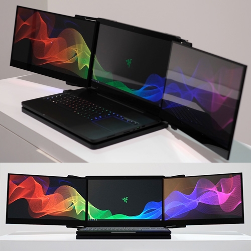Razer Project Valerie Concept - a 12lb laptop with 3 built in monitors for a full 180-degree viewing area, powered by NVIDIA's Surround View technology. Engadget has a hands on look from CES. Check out the keyboard too...