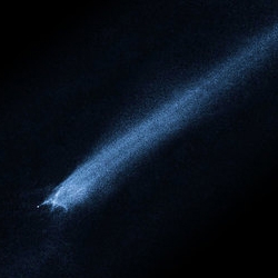 Hubble has discovered a mysterious X-shaped object traveling at 11,000mph. NASA says that P/2010-A2 may be a comet, product of the collision between two asteroids. But what if..