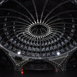 O (Omicron) is a permanent installation directed by Romain Tardy & Thomas Vaquié at Hala Stulecia in Wroclaw, Poland. The incredible architecture of Max Berg and the projection mapping of AntiVJ make for a stunning work of art.
