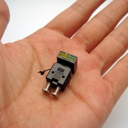 Small robotic sculptures made from parts of old electronics by Anthony Oh.