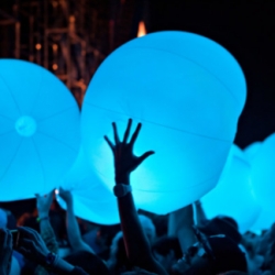 Arcade Fire teamed up with Chris Milk for their interactive stage collaboration performance at Coachella, which included hundreds of LED balls, each one being embedded with IR Transmitters.