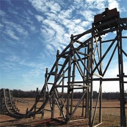 This backyard roller coaster was built by Jeremy Reid in Oklahoma.  Check out the videos of it in action!