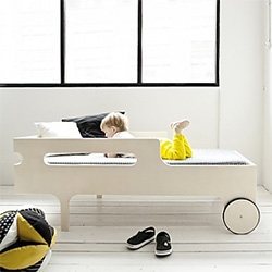 Rafa Kids R Toddler Bed ~ modern and playful, with elevated sides for safety, and you can roll it around easily!