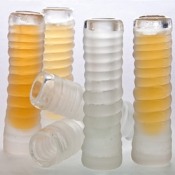 Protecting the vanishing honeybee population, designer Justin Hutchinson has created this glass vessel for a unique drink made from 'urban honey'.