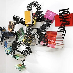 WOKmedia's Between the Lines bookshelf asks you to place your books inside their maze of words. In other words, what you're reading is between the lines. 