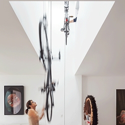 Bicycle pulley atrium storage system in a house in Sydney, Australia, by local architects Tribe Studio.