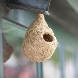 This cute birdfeeder from Gina Hsu and Nagaaki Shaw is one of many pieces made from woven rice straw.