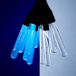 BITTER LIGHT by Gonzalez Garrido is made out Tonic Water and UV LEDs. The quinine radiates some energy in from UV the form of visible blue light.