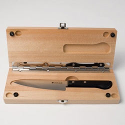 Matching knife and cutting board set from Canoe.  The cutting board doubles as a carrying case.