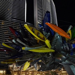 There's just something mesmerizing about 200 aluminum boats strung together with wire as if exploding apart. A look at Big Edge by Nancy Rubins at NIGHT! Glowing in the middle of City Center, Las Vegas.