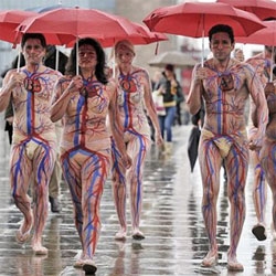 UK’s National Health Service raising awareness for blood donation on the streets of London with blood type/full body suits...