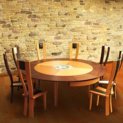 Braun Woodline's line of Round Expanding Tables endowed with an exclusive and patented mechanism allowing the table to remain perfectly circular in its spread  position! Watch the videos!