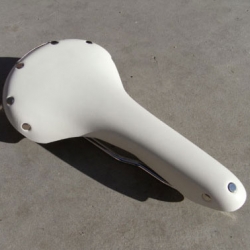 The Wilson Bros. teams with Stussy on development of this limted edition white Brooks Swallow Saddle. The classic Swallow racer is treated with an excetional white leather finish. Imagine the patina on this saddle after a few months of use.