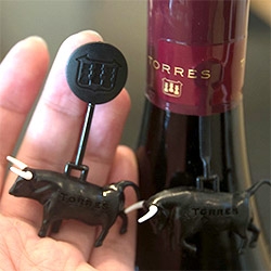 Wine that comes with Toy Bulls! Torres' Sangre de Toro. A peek at the variations in bulls and packaging... so far we have 4, 5, 6, 7, how many are there total?