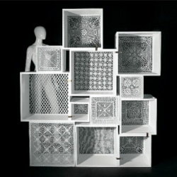 Modular bookshelf with crochet found at Seletti makes me forget about the horrible doilies I attempted in third grade.