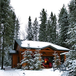  The Prairie Creek Inn in Rocky Mountain House, Alberta is a luxurious bed & breakfast. Peek inside their Aspen Tree House which feels like the perfect log cabin in the woods! We even curled up by the fire pit while it was snowing!