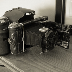 Not quite Steampunk, Photopunk camera hacking is becoming more popular. Here a 1917 Camera is mated directly to a modern DSLR to achieve a vintage experience creating photographs as well as nostalgic results.
