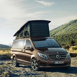 Mercedes-Benz Marco Polo - a luxurious pop top camper with a rear bench that electrically folds flat into a bed and the second berth under the pop-top, an onboard kitchenette with two gas burners, a sink and fridge with a 10 gallons of fresh water and more.
