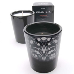 Amazingly subtle transforming candles at Delight ~ they start black, and the patterns emerge as it heats up... "7.5 ounce 100% premium soy candle made by Mine Design.  Handpoured in California."