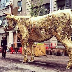 Sebastian Errazuriz created a giant Golden Calf piñata filled with 1000 dollar-bills for this month's Wanted Design in NYC to be smashed on May 20th.