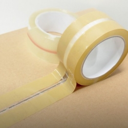Center Tape is a sticky tape that is divided into three bands, two opaque on the sides, and one transparent in the middle.