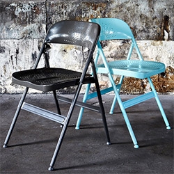 IKEA FRODE Folding chair in dark gray and turquoise with perforations that are both decorative and allow for ventilation. Designer Marcus Arvonen.