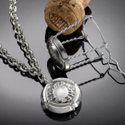 Silver coated Champagne cork pendant made by Feinschmuck.