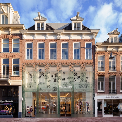 MVRDV has completed the new Chanel flagship store in Amsterdam with a replica façade made entirely out of glass. 