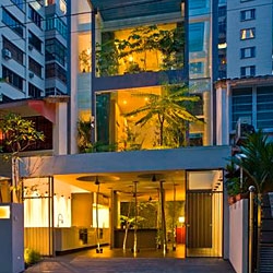 House at Orchard by Chang Architects.
This house is an outcome of an owner’s dream to live in a forest setting amidst the urbanized city of Singapore.