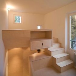 The parents of a lucky Parisian kid hired H²O architectes to create a private space for him in a disused garden shed in the backyard. The interior is all birch ply, on three levels, with dedicated areas for sleeping, living/study, and a bathroom.