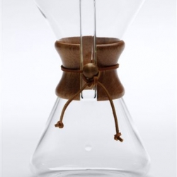 In 1941 chemist Dr. Peter Schlumbohm created the prototype for the Chemex, for his own use, from an Erlenmeyer flask and a laboratory funnel. Fabricated from a single piece of borosilicate laboratory glass, it trades a nice wooden collar for the original duct-tape.