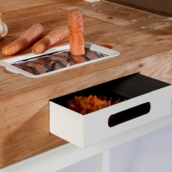 ChopChop Kitchen is a small kitchen counter with built-in storage, tools, and sink. Designed by Dirk Biotto.