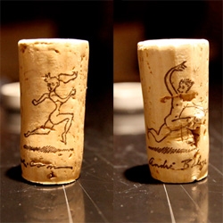 On fun cork design... who's chasing whom? You can spin it around as much as you'd like and on they go... Also nice water colored label on this André Balazs Sunset Beach Rosé 