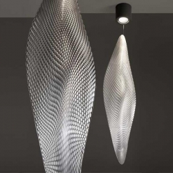 Cosmic Leaf by British designer Ross Lovegrove, it features its fluid form illuminated from a light source from top to the meshed skin.
