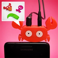 Faunaphones by Eduardo Alessi Will Be Your Mobile Best Friends - The crab is an audio splitter, the gator holds your phone up, the octopus is a cord wrapper!