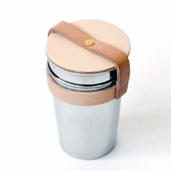 The stainless steel & leather cup set by Yield. A durable and safe alternative to plastic cups for  camping or picnics.