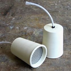 Duncan Wilson designed a wireless version of the 2-paper-cups-and-a-piece-string telephone.