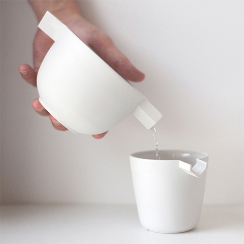 Metrica by Tanya Klimenko. Dinnerware set. Bisque and glazed porcelain. The series includes a cup and a container/bowl. Spout on the cup is comfortable for pouring, and doubles as a handle.