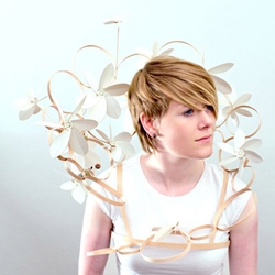 Dandelion, is a wearable that captures energy from wind and human movement, exploring ideas of personal, mobile power generation & kinetics. Designed by Mary Huang in collaboration with Jennyfer Kay.