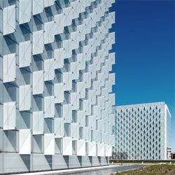 The new headquarters for Telefonica in Madrid feature an interesting glass skin, which acts a brise soleil to protect the buildings from the sun. By Rafael de La-Hoz.