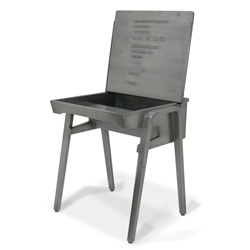 A child's school desk rendered in metal with like engravings, chewing gum and graffiti!  Limited to 25 made! "Based Upon My School" by Jimmy St. James for Citizen:citizen 

