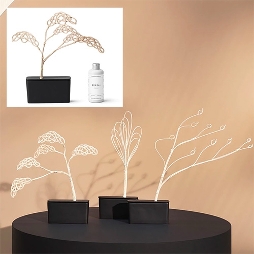 Bonsai Room Diffusers designed By Takafumi Nemoto for Design House Stockholm in Breeze, Blossom, and Cloud. Each comes with a ceramic vase, natural rattan fragrance diffuser and scented oil.