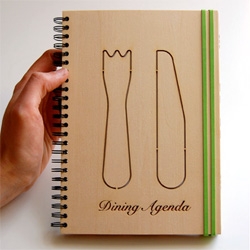 London-based, Italian designers Sara Ferrari and Marcella Fiori have designed a book of place mats for note-taking during meals ~ with built in utensils even! Very cute ~ check out how it works!
