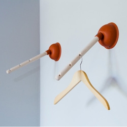 The idea of the designer Armin Fischer was to create a mix of hotel and hostel. The result is  Superbude (Supershack) a budget-hostel in Hamburg with funny design elements like coat-hangers made of plumber's helpers.