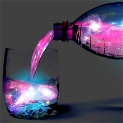 Aurora Jungle-Juice - Aurora is TCCs black light phosphorescent take on jungle-juice.  Originally conceived in 2006, it is a drink that is pink in natural light, but glows aqua-marine in black-light. 
