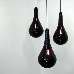 A heavy drop of black oil is actually a lamp by Save Our Souls design people
