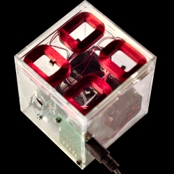 NaughtyBox is a playful device that represents ambient sound with physical movement. By putting four tiny magnetic cubes inside the box and singing, the cubes dance and bounce in response to the sound.
