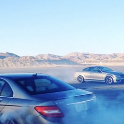 A pair of Mercedes-AMG C63 507 editions (sedan vs coupé) donut duel in the California desert during the Best of AMG at Willow Springs. 